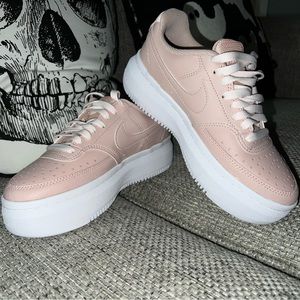 Nike light pink low platform